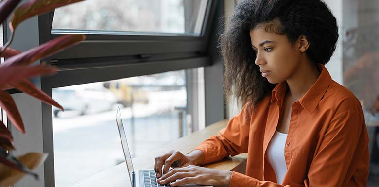 Woman using her laptop to surf the web